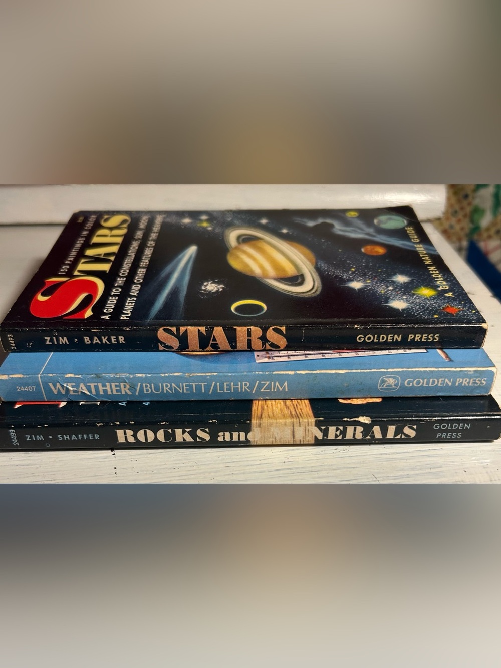 Antique paperback books. Rocks&Minerals 1957 1st Weather 1975 3rd Stars 1956 2nd